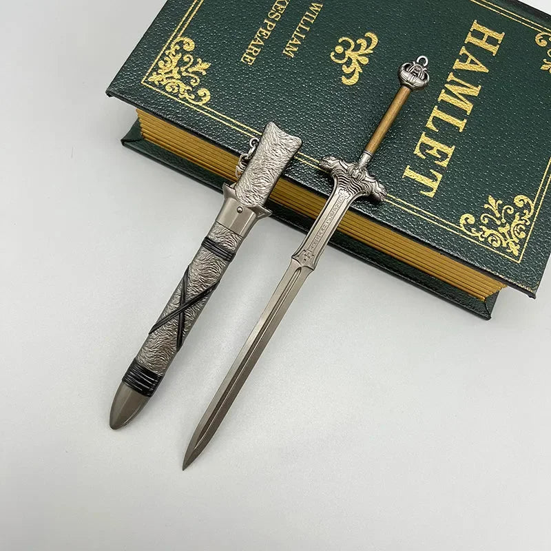 1:6 anime-style zinc alloy sword replica with sheath, displayed on a Hamlet book