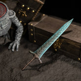 A gift from the Dark Moon. 🌙 This stunning Dark Moon Greatsword replica captures the magical frost essence of Ranni’s legendary weapon. Featuring intricate leaf patterns on the blade and a weathered antique finish. A perfect Elden Ring collectible for your desk setup or Ranni the Witch shrine.