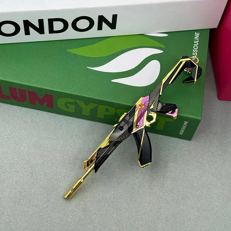 1:6 anime-style zinc alloy weapon replica with gold and black accents on tabletop, BlacksmithSONG collectible.