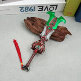 Anime-style zinc alloy fantasy sword replica with green and red details, display collectible