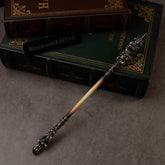 Chitin Staff replica (22cm die-cast zinc alloy staff) — spiked head up, cream shaft fading to dark ends, by BlacksmithSONG.