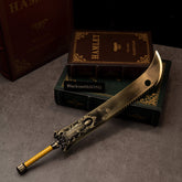 Zodiac Tiger Sabre replica (35cm die-cast zinc alloy greatsword) — curved brass blade on stacked books, by BlacksmithSONG.
