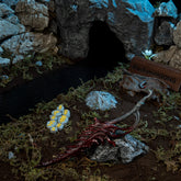 Reduvia replica displayed on a rock near a dark stream, with Murkwater Cave and a severed Bloody Finger in the background.