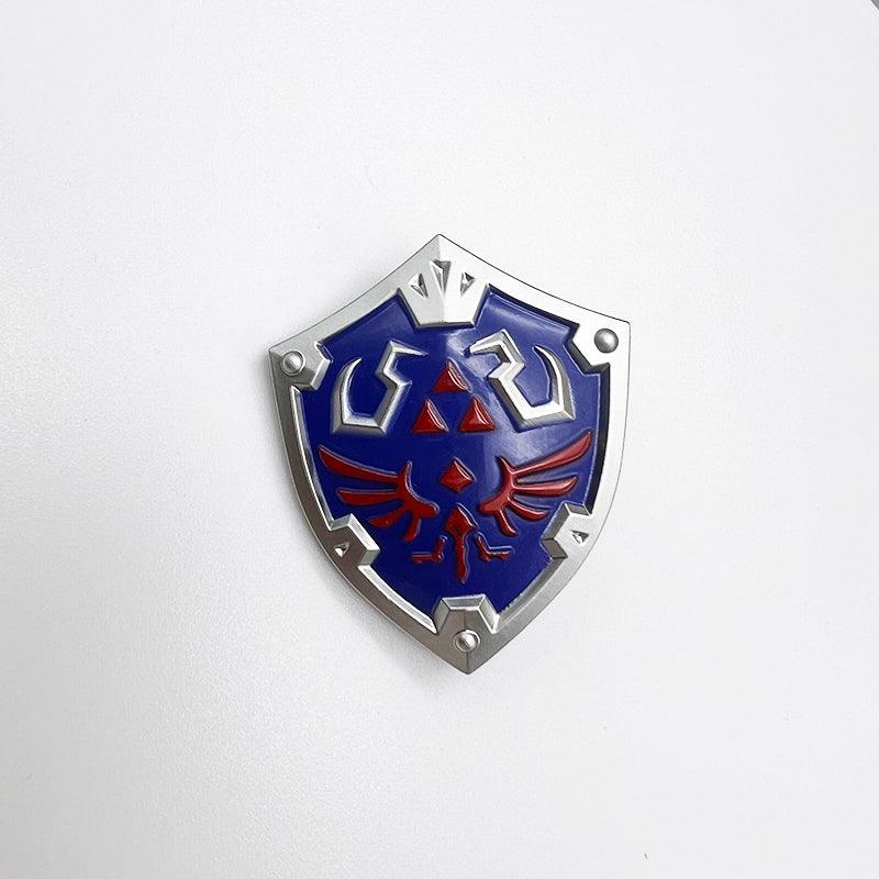 Hylian Shield Replica - The Legend of Zelda Timeless Defender 1:6 Zinc Alloy | Triforce Embossed Zinc Alloy & Royal Blue Enamel | Castle Town Heritage Display for Hyrule's Guardians - BlacksmithSONG