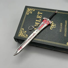 1:6 anime-style zinc alloy sword keychain collectible with red accents on a Hamlet book