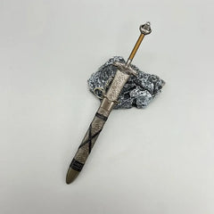 1:6 scale anime-style zinc alloy sword replica with textured sheath, displayed on gray stone