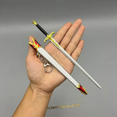 Hand holding a 1:6 anime-style zinc alloy sword replica with scabbard keychain