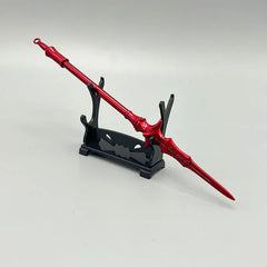 Red anime-style zinc alloy spear replica on black stand, collectible display at BlacksmithSONG
