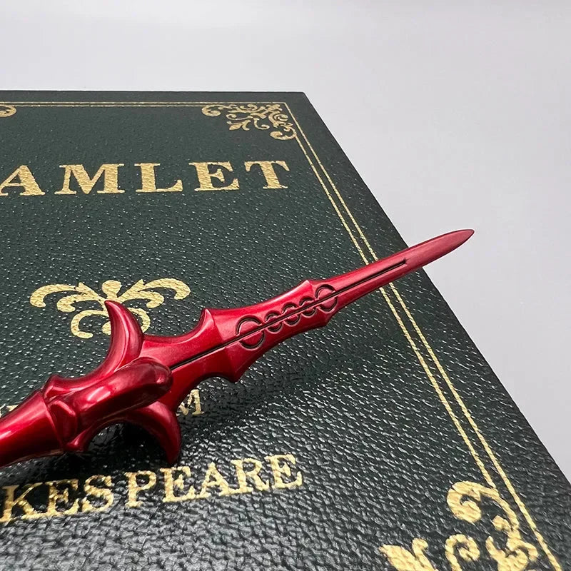 Red anime-style zinc alloy replica sword on Hamlet book for display or cosplay collectible