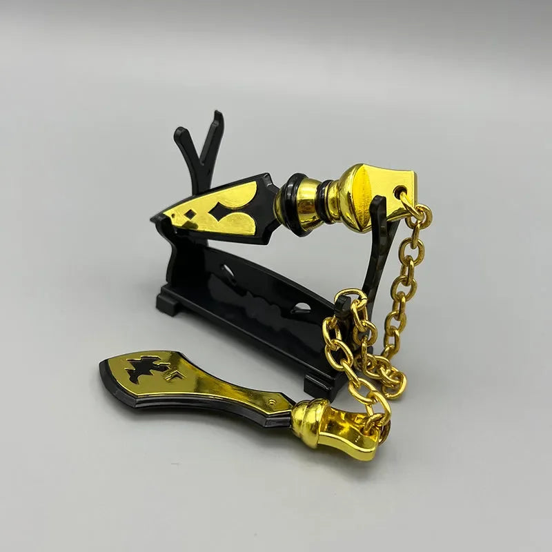 1:6 scale anime-style zinc alloy dagger replica with black and gold details on display stand