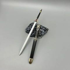 1:6 anime-style zinc alloy sword replica with black and gold scabbard on gray background