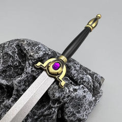 1:6 scale anime-style zinc alloy sword replica with purple gem, displayed on textured rock