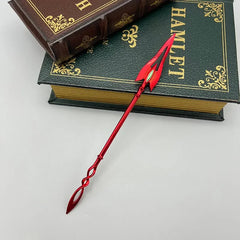 Red anime-style zinc alloy spear replica on vintage books, collectible display from BlacksmithSONG