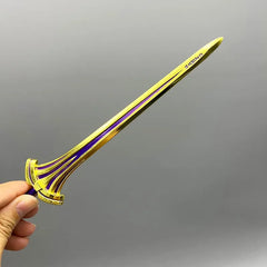 Hand holding 1:6 scale anime-style gold and purple zinc alloy sword replica collectible