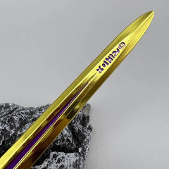 Gold anime sword replica with purple engravings, zinc alloy collectible for display or cosplay