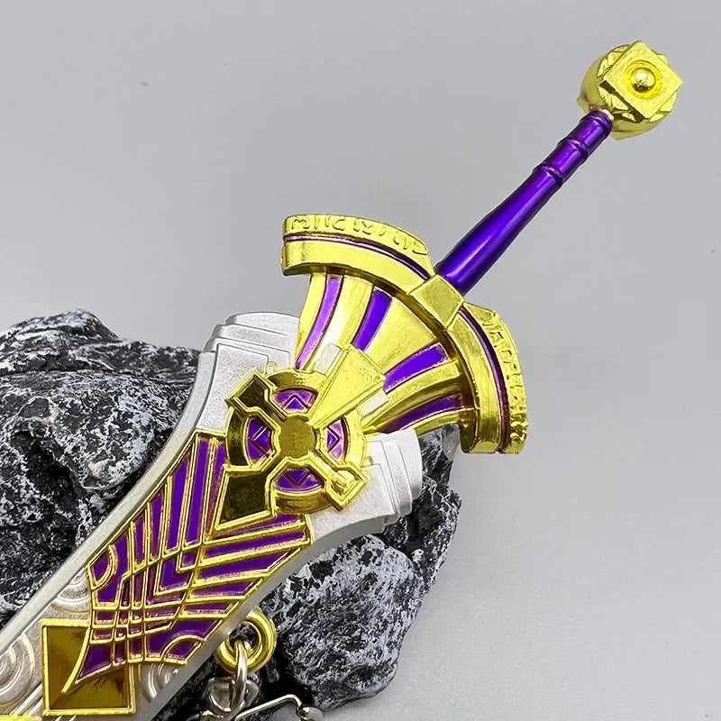 Purple and gold anime-style zinc alloy sword replica collectible displayed on a rock
