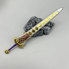 1:6 scale anime-style zinc alloy sword replica with gold and purple accents on gray rock