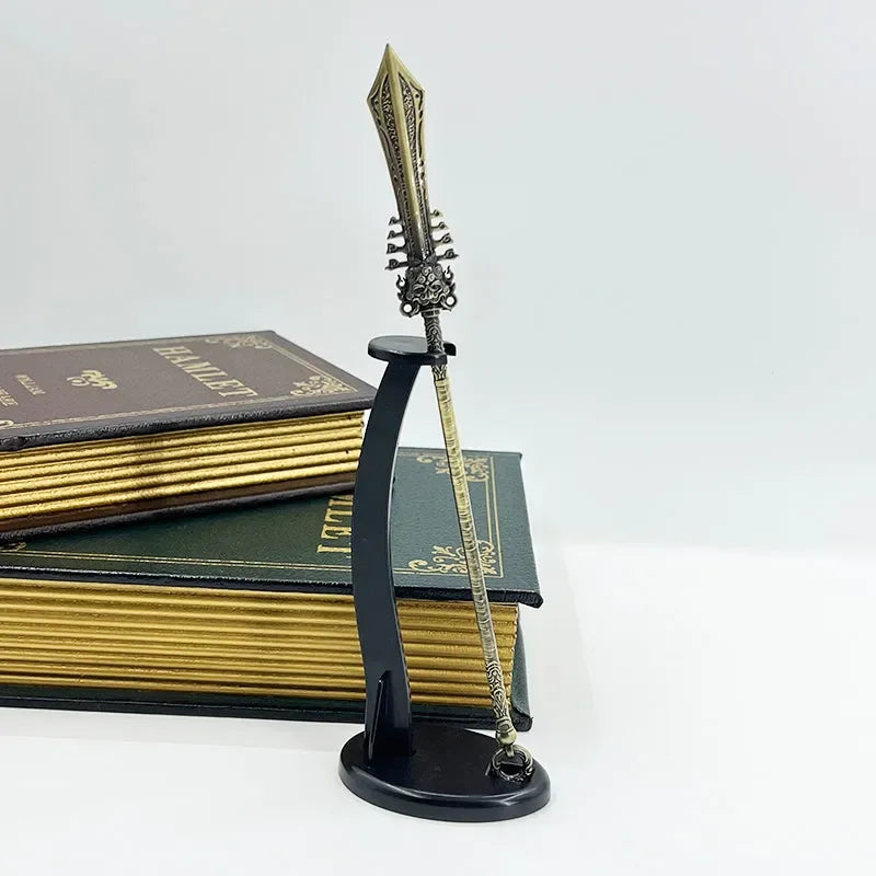 Anime-style zinc alloy spear replica on stand, display with hardcover books, collectible decor