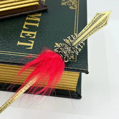 Anime-style zinc alloy sword replica with red tassel on a green book, BlacksmithSONG collectible.