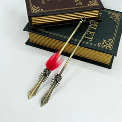 Two 1:6 scale anime-style zinc alloy weapon replicas with red tassels beside vintage books