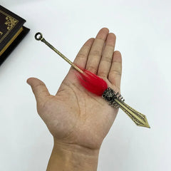Hand holding 1:6 scale anime-style zinc alloy weapon replica with red plume, BlacksmithSONG collectible.