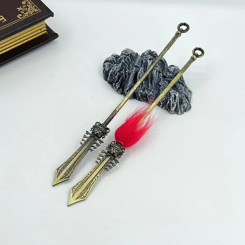 Anime-style zinc alloy sword replicas with ornate handles and red tassel, collectible display