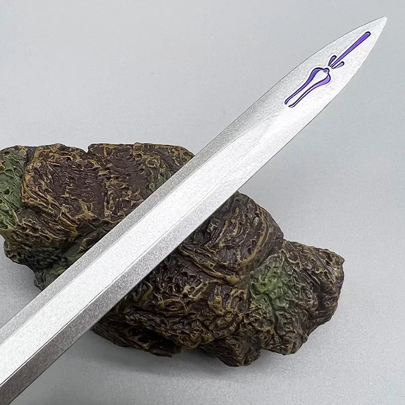Anime-style zinc alloy sword replica with purple marking on blade, displayed on rock stand