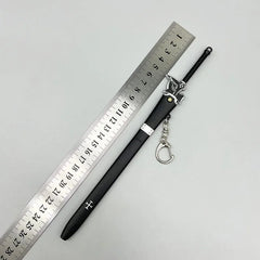 1:6 scale anime-style black zinc alloy sword replica with sheath and keychain beside ruler