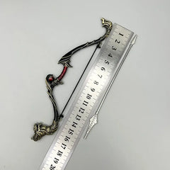 1:6 scale anime-style zinc alloy bow and arrow replica beside metal ruler on gray background