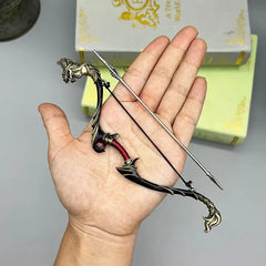 Hand holding a detailed 1:6 anime-style zinc alloy bow and arrow replica collectible