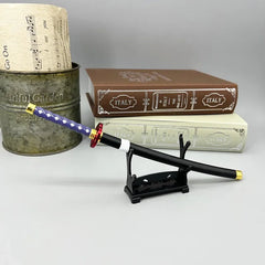 1:6 scale anime-style zinc alloy katana replica with blue handle on display stand, books behind