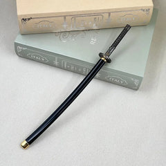 Anime-style 1:6 black katana zinc alloy replica on books, collectible display at BlacksmithSONG