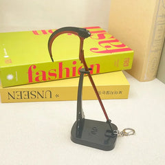 Anime-style 1:6 zinc alloy scythe replica keychain on display stand, BlacksmithSONG collectible