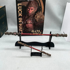 Anime-style zinc alloy replica staff on display stand, Sun Wukong artwork background, BlacksmithSONG collectible.