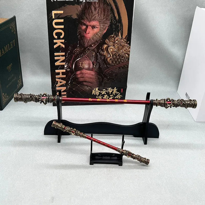 Anime-style zinc alloy replica staff on display stand, Sun Wukong artwork background, BlacksmithSONG collectible.