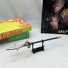 1:6 scale anime-style zinc alloy spear replica on stand, display books and fantasy artwork backdrop