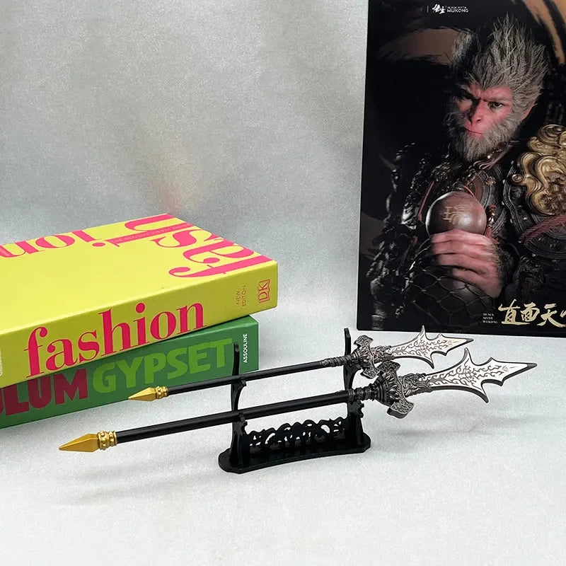 Anime-style zinc alloy spear replicas on display stand, BlacksmithSONG collectible, books in background