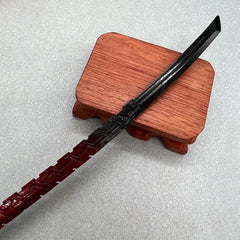 1:6 anime-style zinc alloy katana replica with jagged blade on wooden display stand