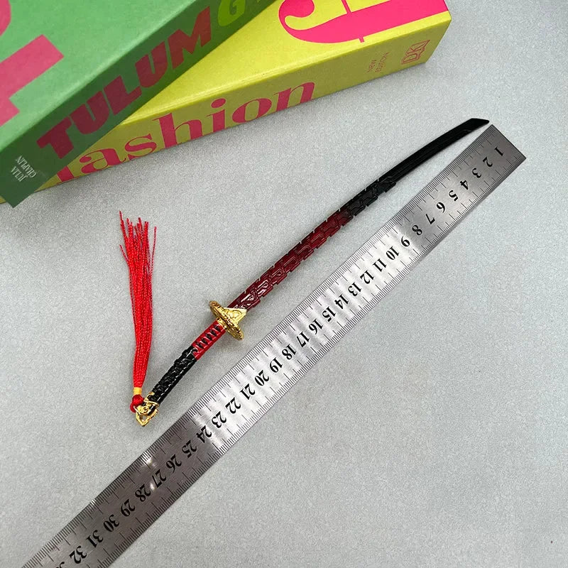 1:6 scale anime-style zinc alloy katana replica with red tassel, displayed beside a ruler on a gray surface.