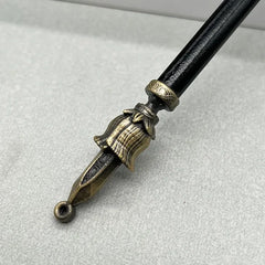 Detailed close-up of ornate anime-style zinc alloy sword replica with bronze accents, BlacksmithSONG collectible.
