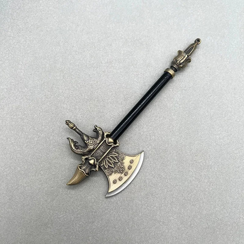 Anime-style zinc alloy axe replica with ornate gold detailing on a gray background