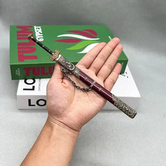 Hand holding anime-style 1:6 zinc alloy sword replica with ornate sheath, BlacksmithSONG collectible