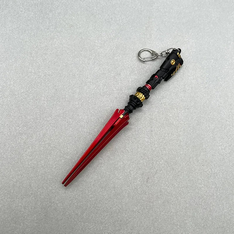 Anime-style zinc alloy red and black weapon replica keychain on gray background