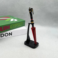 1:6 anime-style zinc alloy weapon replica with red and black details on display stand