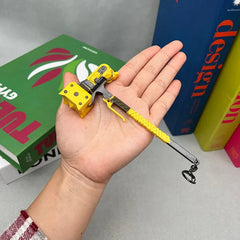 Hand holding a 1:6 scale anime-style yellow and gray zinc alloy weapon replica collectible