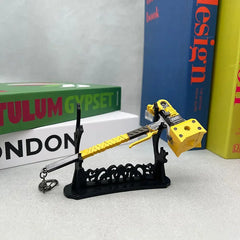 Anime-style yellow zinc alloy hammer replica on display stand, ideal for cosplay or collectibles