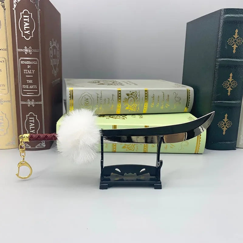 Anime-style 1:6 zinc alloy mini sword collectible with fluffy white keychain on display stand