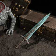 A gift from the Dark Moon.  This stunning Dark Moon Greatsword replica captures the magical frost essence of Ranni’s legendary weapon. Featuring intricate leaf patterns on the blade and a weathered antique finish. A perfect Elden Ring collectible for your desk setup or Ranni the Witch shrine.