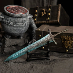 Transform your gaming desk into Ranni’s Rise with this Dark Moon Greatsword metal replica.  Displayed on a custom stand, this Elden Ring sword features stunning frost-blue details and antique weathering. The perfect gaming room accessory or gift for Soulsborne fans.-small display stand