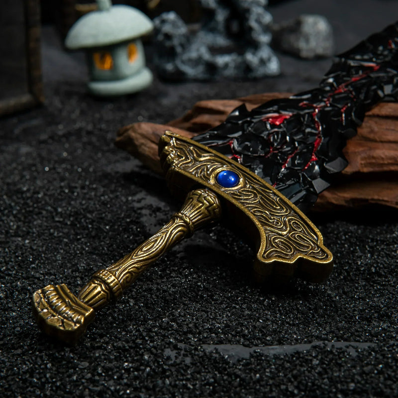 Zoom in on the Rune of Death. ?? This Maliketh's Black Blade replica features incredible texture work—the blade looks like cracked obsidian infused with red energy. The golden hilt is adorned with intricate engravings. A masterpiece of metal art for Elden Ring collectors.